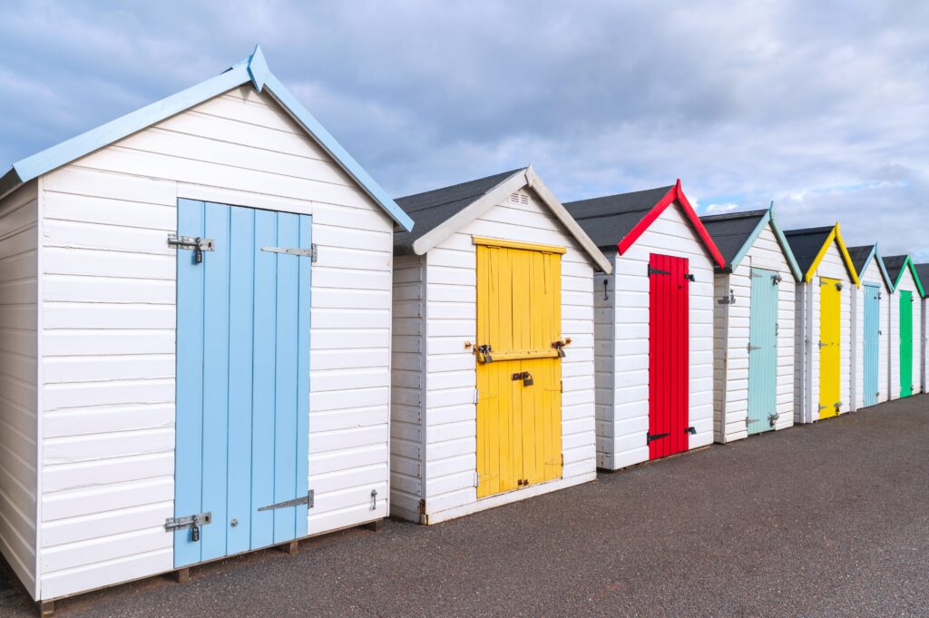 Beach huts painted in wood paint