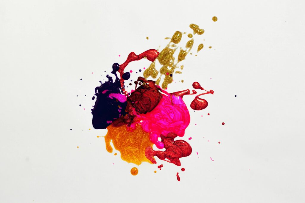 Colorful abstract wood paint splash on white background, capturing creative expression.